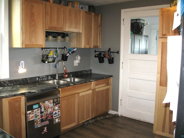 627 4th St, Proctor, MN 55810 - kitchen with dishwasher, dark countertops, and dark wood-type flooring
