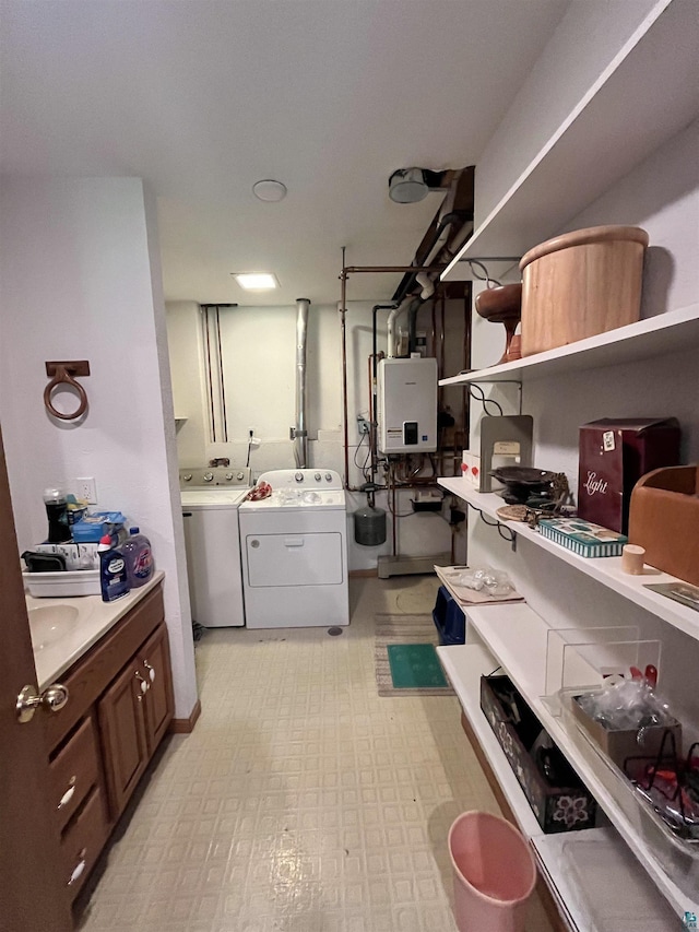4384 Ugstad Rd, Hermantown, MN 55811 - laundry area featuring washer and clothes dryer and tankless water heater