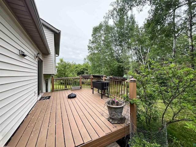 4384 Ugstad Rd, Hermantown, MN 55811 - deck featuring view of wooded area