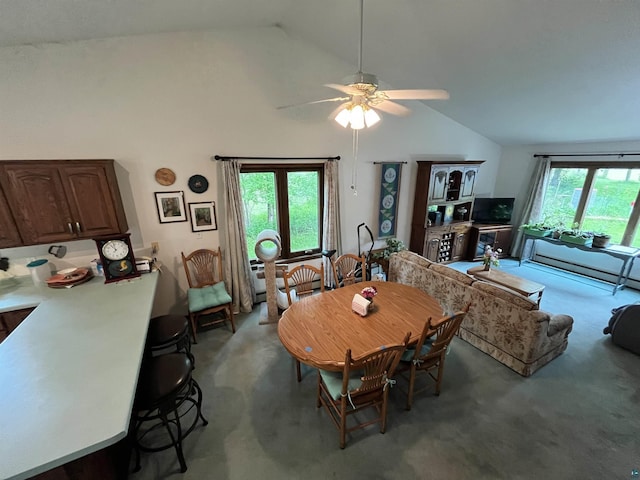4384 Ugstad Rd, Hermantown, MN 55811 - carpeted dining room featuring a ceiling fan and high vaulted ceiling