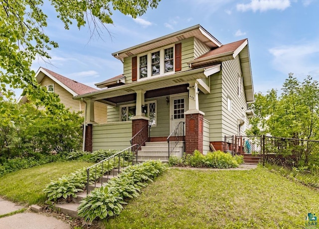 406 N 43rd Ave W, Duluth, MN 55807 - view of front of house featuring stairs, a front yard, and covered porch