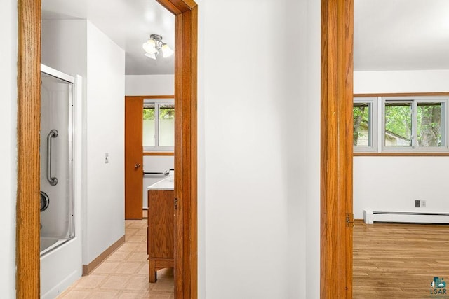4724 E Ayers Rd, Saginaw, MN 55779 - corridor featuring baseboard heating and light floors