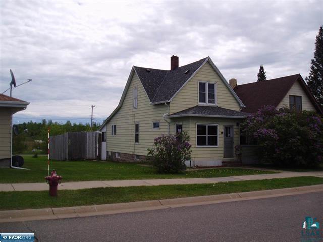 104 S 6th Ave, Biwabik, MN 55708 - view of front of property featuring a chimney