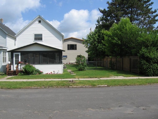 421 E Chapman St, Ely, MN 55731 - back of house with a sunroom