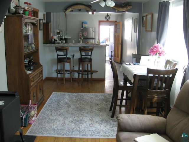 421 E Chapman St, Ely, MN 55731 - dining area featuring wood finished floors and a ceiling fan