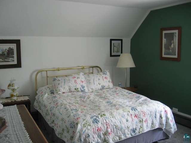 421 E Chapman St, Ely, MN 55731 - bedroom featuring vaulted ceiling and baseboard heating