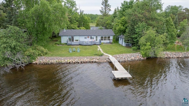 4284 Turner Rd, Duluth, MN 55803 - dock featuring a lawn, a deck with water view, and a forest view