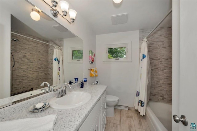 4284 Turner Rd, Duluth, MN 55803 - full bathroom featuring vanity, shower / tub combo, and baseboard heating