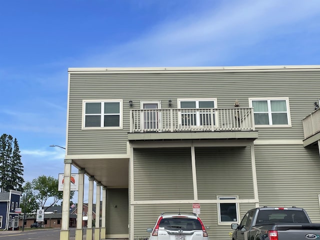 126 W Bayfield St Unit 204, Washburn, WI 54891 - rear view of property with a balcony