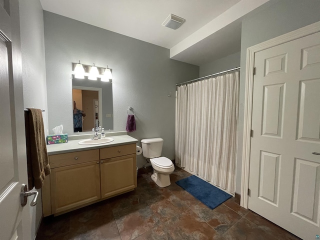 126 W Bayfield St Unit 204, Washburn, WI 54891 - bathroom with vanity, a shower with curtain, and stone finish floors