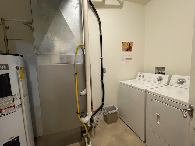 126 W Bayfield St Unit 204, Washburn, WI 54891 - washroom featuring water heater and washing machine and clothes dryer