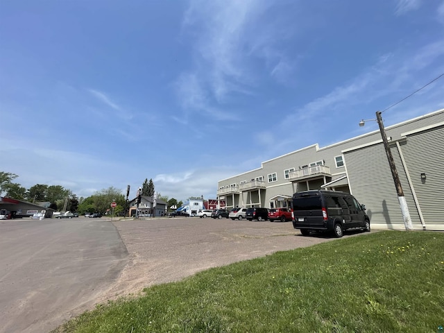 126 W Bayfield St Unit 204, Washburn, WI 54891 - view of asphalt street featuring a residential view and traffic signs
