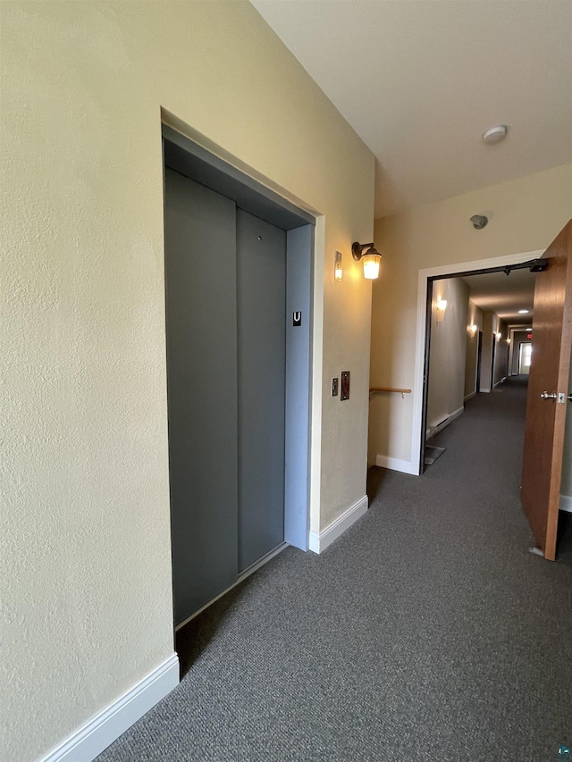 126 W Bayfield St Unit 204, Washburn, WI 54891 - hallway featuring elevator and dark carpet