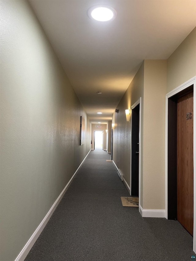 126 W Bayfield St Unit 204, Washburn, WI 54891 - corridor with dark carpet and baseboards