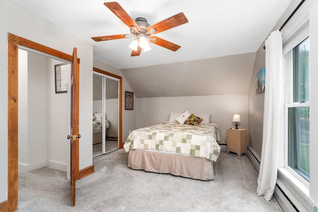 324 W Wabasha St, Duluth, MN 55803 - bedroom featuring a baseboard heating unit, light colored carpet, baseboard heating, lofted ceiling, and ceiling fan