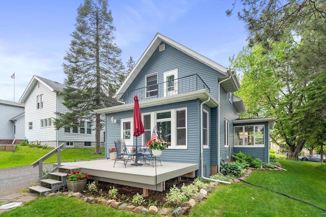 324 W Wabasha St, Duluth, MN 55803 - back of house featuring a deck and a yard