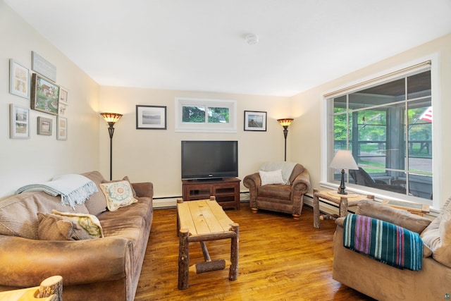 324 W Wabasha St, Duluth, MN 55803 - living area featuring wood finished floors and baseboard heating