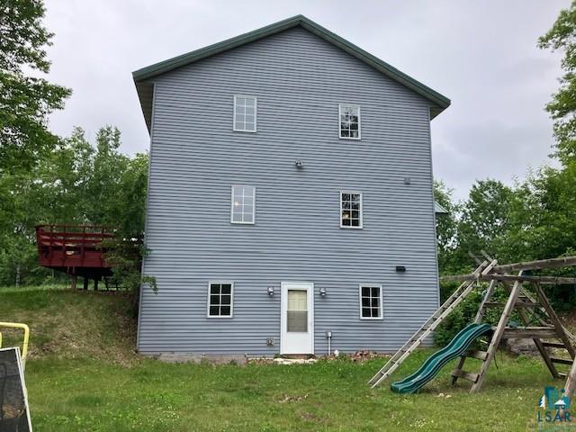 34358 State Highway 18, Finlayson, MN 55735 - rear view of property with a playground and a lawn