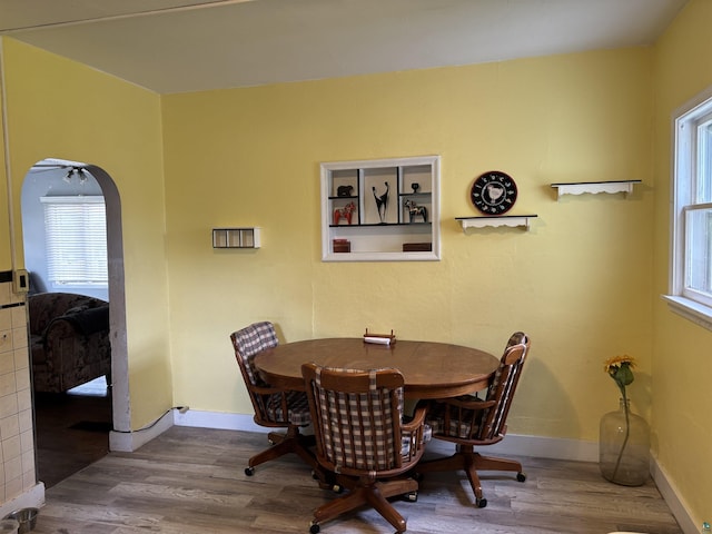 403 E Camp St, Ely, MN 55731 - dining space featuring healthy amount of natural light and wood finished floors