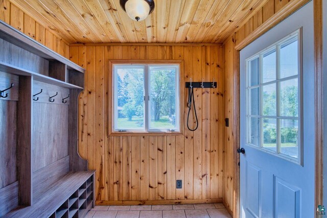 305 W Central Ave, Aurora, MN 55705 - mudroom featuring healthy amount of natural light, wooden ceiling, wooden walls, and light tile patterned floors