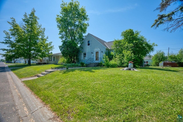 305 W Central Ave, Aurora, MN 55705 - view of front facade with a front yard