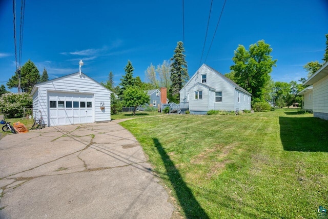 305 W Central Ave, Aurora, MN 55705 - view of green lawn with an outbuilding and a garage