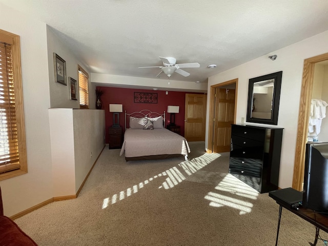 34 N 2nd St Unit 2, Bayfield, WI 54814 - carpeted bedroom with baseboards and ceiling fan