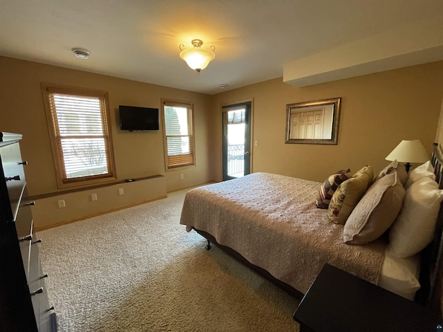 34 N 2nd St Unit 2, Bayfield, WI 54814 - bedroom with multiple windows and carpet floors