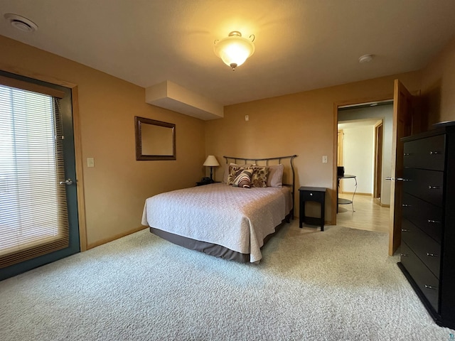 34 N 2nd St Unit 2, Bayfield, WI 54814 - bedroom featuring light carpet and multiple windows