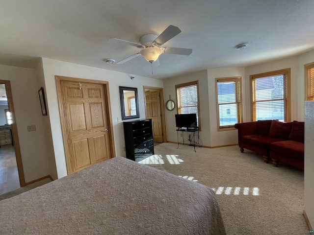 34 N 2nd St Unit 2, Bayfield, WI 54814 - bedroom with multiple windows, light colored carpet, and ceiling fan