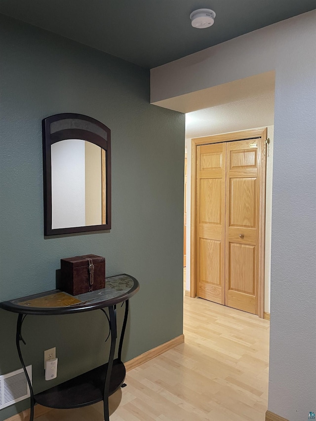 34 N 2nd St Unit 2, Bayfield, WI 54814 - hallway featuring light wood-style floors and baseboards