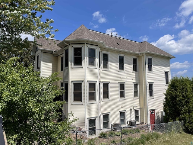 34 N 2nd St Unit 2, Bayfield, WI 54814 - rear view of house with a shingled roof