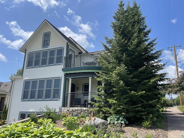 36 N 2nd St Unit 6, Bayfield, WI 54814 - victorian house featuring a balcony and covered porch