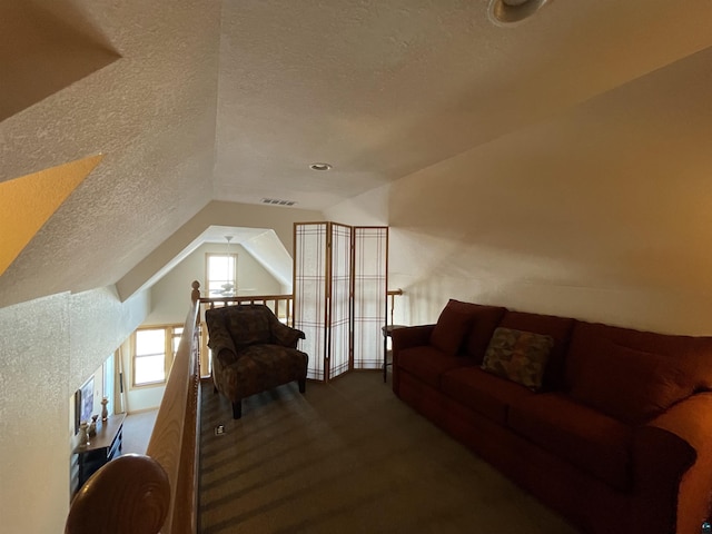 36 N 2nd St Unit 6, Bayfield, WI 54814 - carpeted bedroom with a textured ceiling and lofted ceiling