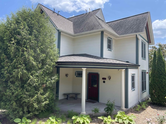 36 N 2nd St Unit 6, Bayfield, WI 54814 - view of front of house with roof with shingles and covered porch