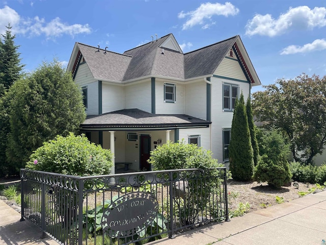 36 N 2nd St Unit 6, Bayfield, WI 54814 - victorian house with a porch and roof with shingles