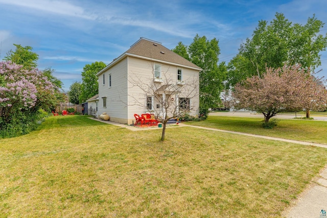 343 E Harvey St, Ely, MN 55731 - view of home's exterior with a patio