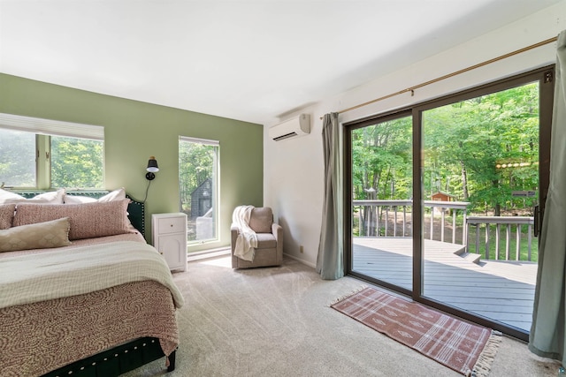 4921 W Pioneer Rd, Duluth, MN 55803 - bedroom with an AC wall unit, access to outside, and carpet floors