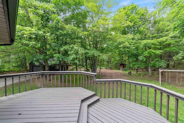 4921 W Pioneer Rd, Duluth, MN 55803 - wooden terrace with a storage shed and a lawn