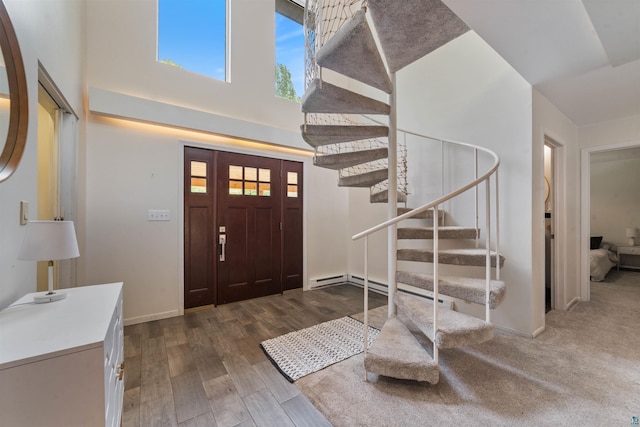 4921 W Pioneer Rd, Duluth, MN 55803 - entryway with stairway, wood finished floors, and a towering ceiling