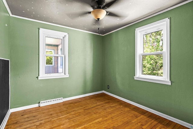 1707 Swan Lake Rd, Duluth, MN 55811 - unfurnished room featuring hardwood / wood-style floors, ceiling fan, and ornamental molding