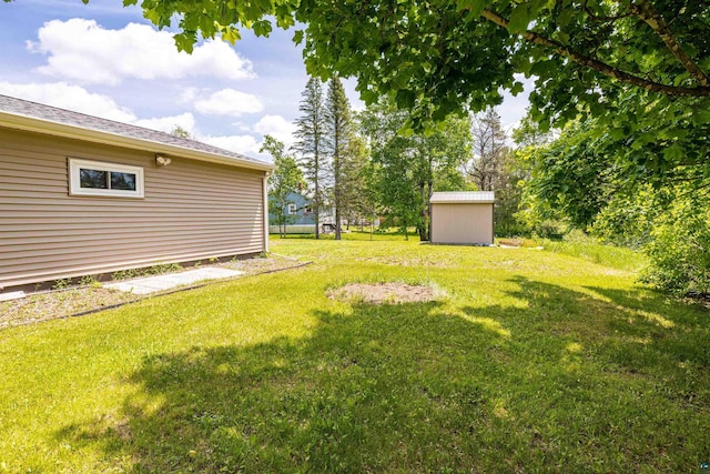1707 Swan Lake Rd, Duluth, MN 55811 - view of green lawn featuring a storage unit