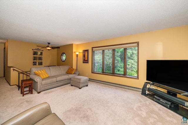 1819 Yosemite Ave, Duluth, MN 55811 - living area featuring carpet floors, a baseboard radiator, and a ceiling fan