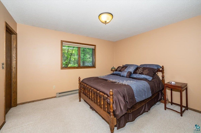 1819 Yosemite Ave, Duluth, MN 55811 - carpeted bedroom featuring baseboard heating and baseboards