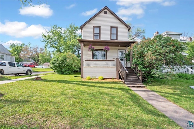 2973 Devonshire St, Duluth, MN 55806 - view of front of home featuring a front yard, a porch, and stairway