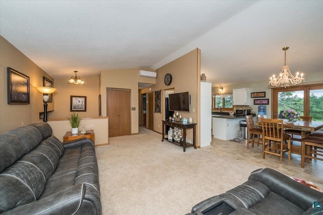 140 E Harney Rd, Esko, MN 55733 - living area featuring a chandelier, vaulted ceiling, and light carpet