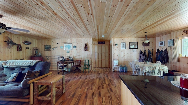 XX3 Sugar Bush Trl, Orr, MN 55771 - living area with wood ceiling, wood walls, wood finished floors, and a ceiling fan