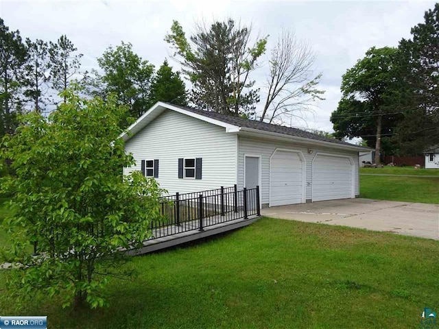 410 S 2nd St, Tower, MN 55790 - view of home's exterior with a detached garage