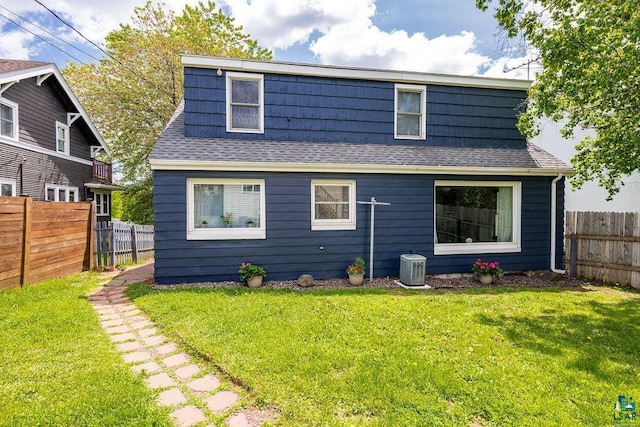 2025 E 8th St, Duluth, MN 55812 - rear view of property with roof with shingles and a fenced backyard