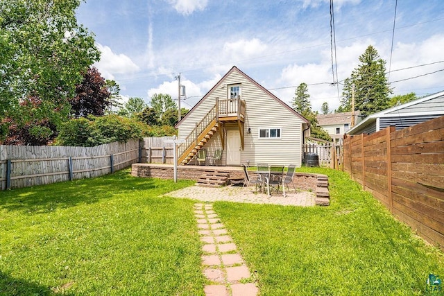 2025 E 8th St, Duluth, MN 55812 - rear view of property featuring a fenced backyard and stairway